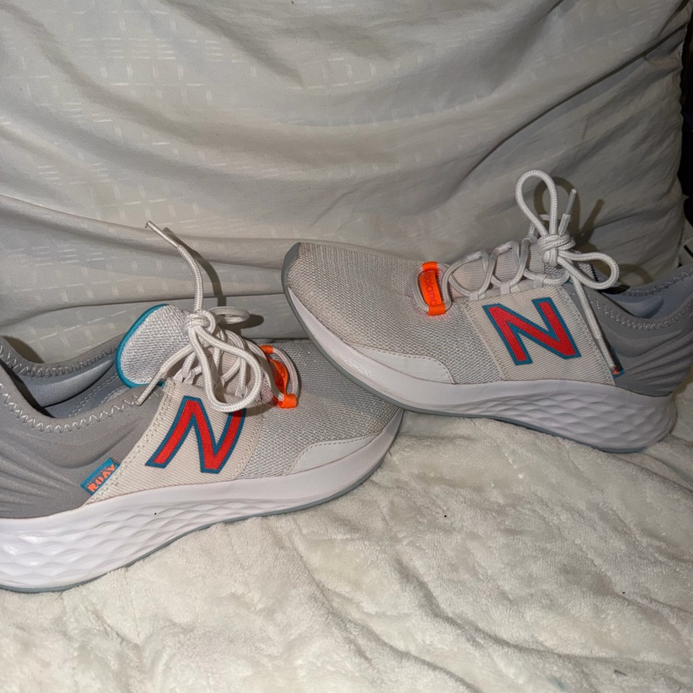 New Balance womens Light Gray and Bright Orange Sneakers